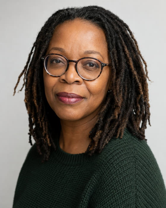 Adaeze Okonjo, Director of the Branded Content Studio, photographed against a pale studio background.